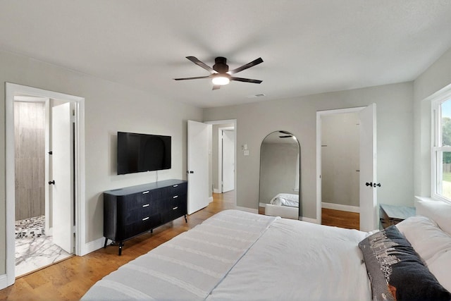 53 Devonshire Dr, Bedford, TX 76021 - bedroom with wood finished floors, baseboards, and a ceiling fan