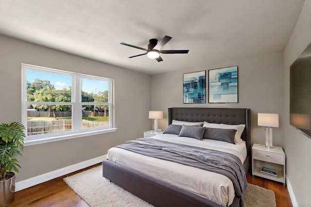 53 Devonshire Dr, Bedford, TX 76021 - bedroom with wood finished floors, baseboards, and a ceiling fan