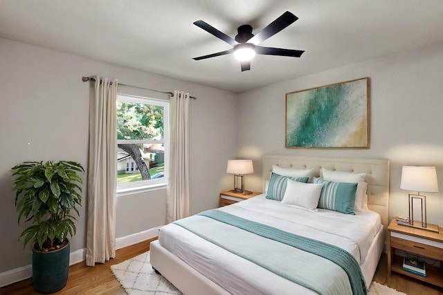 53 Devonshire Dr, Bedford, TX 76021 - bedroom featuring wood finished floors, baseboards, and a ceiling fan