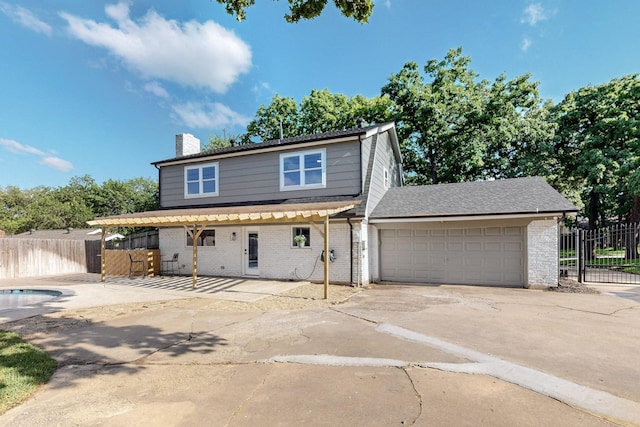 53 Devonshire Dr, Bedford, TX 76021 - view of front of home with brick siding, driveway, a garage, and a chimney