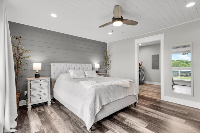 325 Beasley Rd, Combine, TX 75159 - bedroom featuring electric panel, recessed lighting, dark wood-style floors, washer / dryer, and baseboards