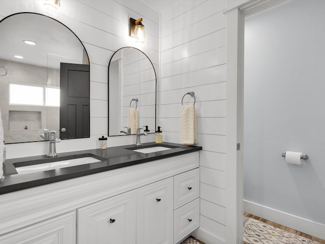 325 Beasley Rd, Combine, TX 75159 - bathroom with double vanity and baseboards