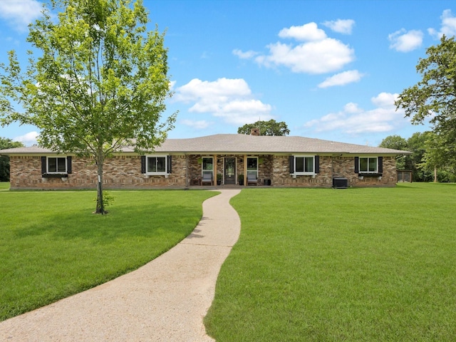 325 Beasley Rd, Combine, TX 75159 - single story home featuring a front yard and central AC
