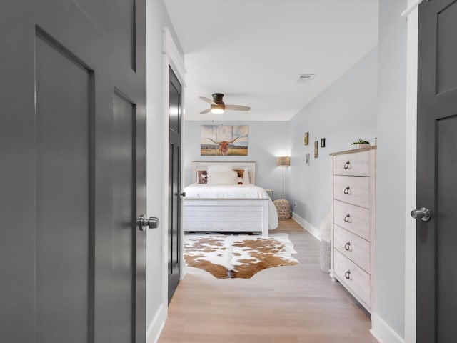 325 Beasley Rd, Combine, TX 75159 - bedroom with light wood finished floors, baseboards, and ceiling fan