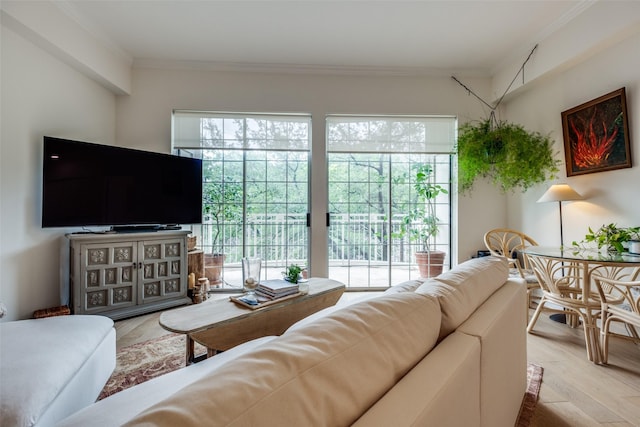 3225 Turtle Creek Blvd Unit 326, Dallas, TX 75219 - living area featuring healthy amount of natural light, light wood-type flooring, and ornamental molding