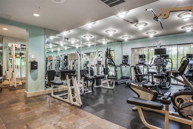 3225 Turtle Creek Blvd Unit 326, Dallas, TX 75219 - exercise room featuring baseboards and recessed lighting