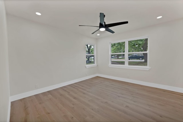 1146 Norwood Dr, Hurst, TX 76053 - spare room with wood finished floors, baseboards, recessed lighting, and a ceiling fan