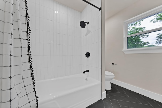 1146 Norwood Dr, Hurst, TX 76053 - bathroom featuring toilet, tile patterned floors, shower / bathtub combination with curtain, and baseboards