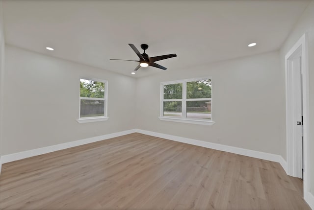 1146 Norwood Dr, Hurst, TX 76053 - empty room featuring plenty of natural light, light wood-style floors, a ceiling fan, baseboards, and recessed lighting