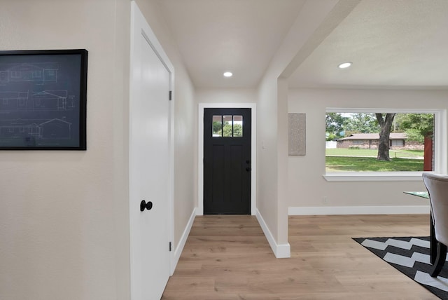 1146 Norwood Dr, Hurst, TX 76053 - foyer entrance with wood finished floors, baseboards, and recessed lighting