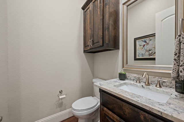 725 Sir Barton Trl, Keller, TX 76248 - half bathroom with toilet, vanity, and baseboards