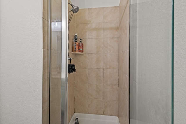 417 Burberry, Grand Prairie, TX 75052 - full bathroom with a stall shower and a textured wall