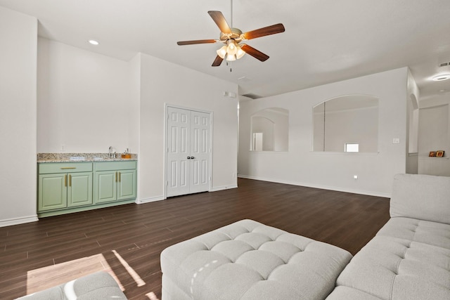 417 Burberry, Grand Prairie, TX 75052 - living area with ceiling fan, dark wood finished floors, and baseboards