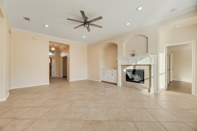 1527 Pleasant Run, Allen, TX 75002 - unfurnished living room featuring light tile patterned flooring, a tiled fireplace, crown molding, recessed lighting, and ceiling fan