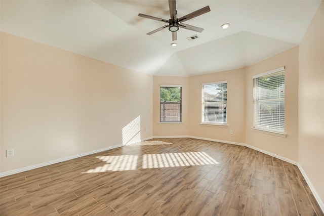 1527 Pleasant Run, Allen, TX 75002 - spare room featuring healthy amount of natural light, light wood-style floors, vaulted ceiling, baseboards, and recessed lighting