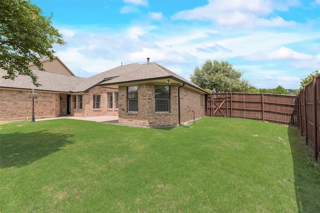 1527 Pleasant Run, Allen, TX 75002 - rear view of house with a patio, brick siding, and a shingled roof