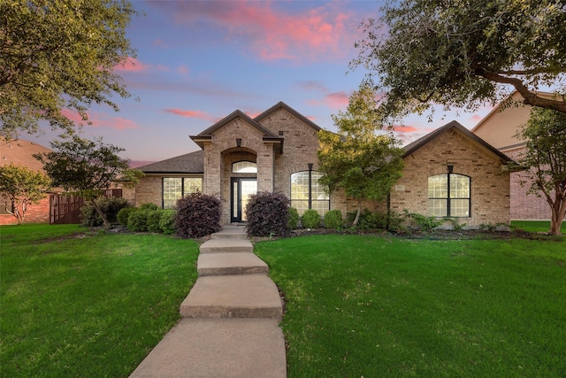 1527 Pleasant Run, Allen, TX 75002 - view of front facade featuring brick siding and a front lawn