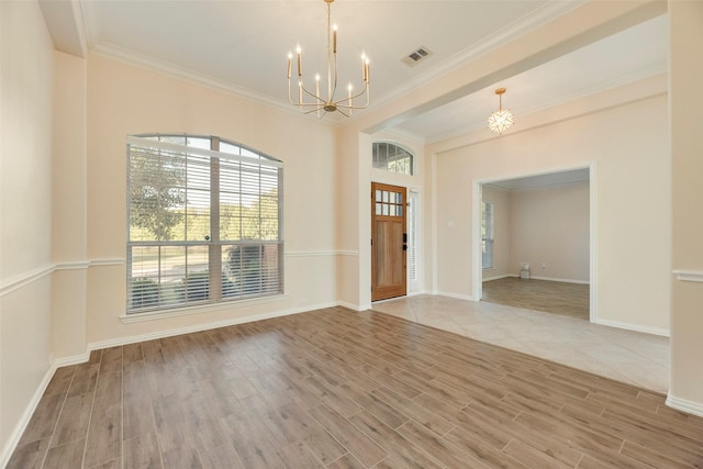 1527 Pleasant Run, Allen, TX 75002 - foyer featuring a chandelier, wood finished floors, crown molding, and baseboards