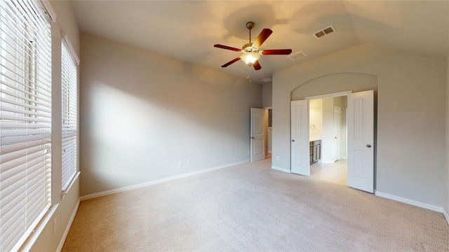 304 Eden Dr, Fate, TX 75189 - unfurnished bedroom with light colored carpet, baseboards, lofted ceiling, and a ceiling fan