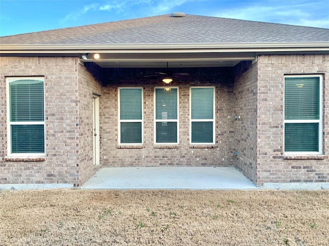 304 Eden Dr, Fate, TX 75189 - back of property featuring brick siding and a patio