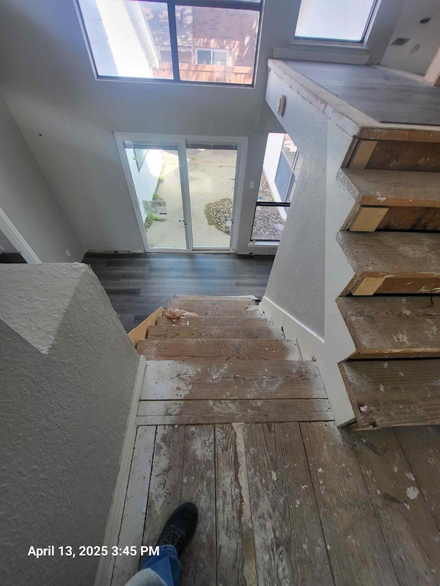 202 Sunset Dr, Glenn Heights, TX 75154 - staircase featuring hardwood / wood-style floors