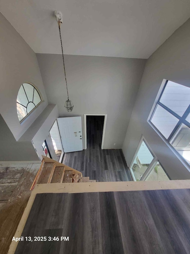202 Sunset Dr, Glenn Heights, TX 75154 - interior space with wood finished floors and high vaulted ceiling