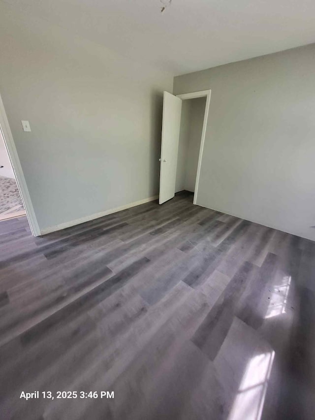 202 Sunset Dr, Glenn Heights, TX 75154 - spare room featuring dark wood-type flooring