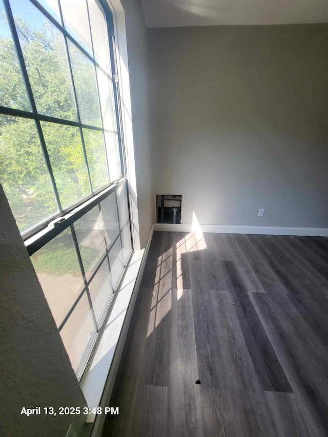 202 Sunset Dr, Glenn Heights, TX 75154 - unfurnished room featuring wood finished floors and baseboards