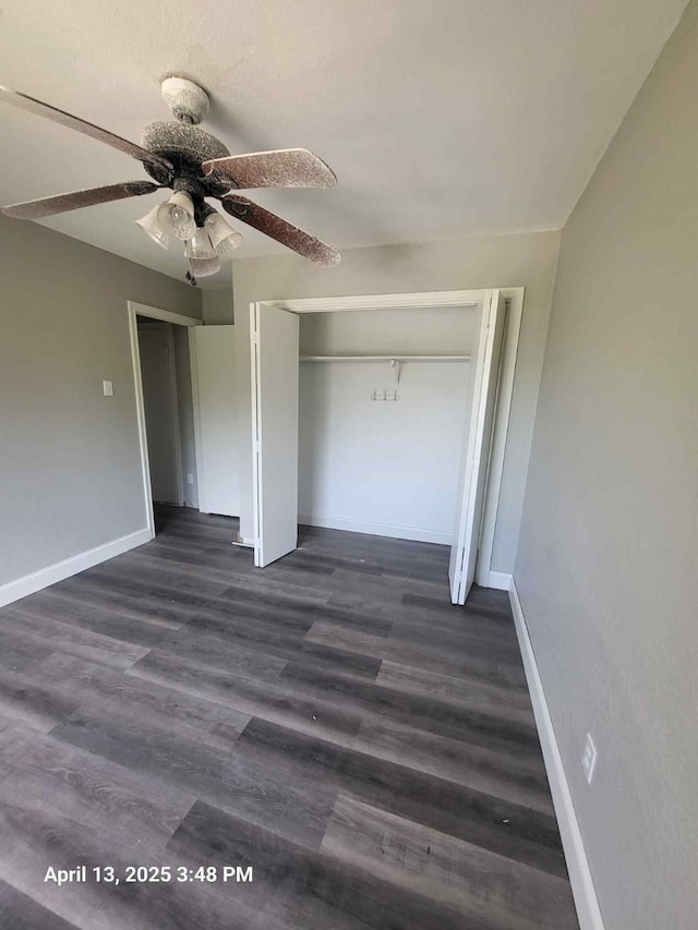 202 Sunset Dr, Glenn Heights, TX 75154 - unfurnished bedroom with baseboards, a closet, a ceiling fan, and dark wood-style floors
