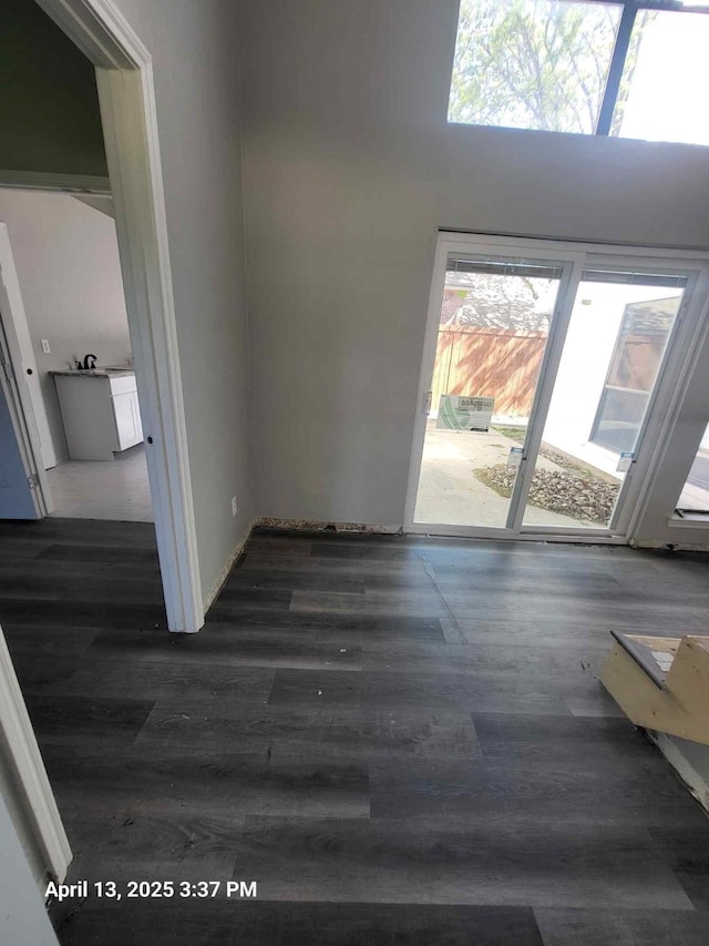 202 Sunset Dr, Glenn Heights, TX 75154 - spare room with wood finished floors