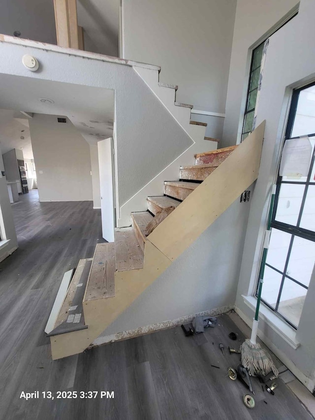 202 Sunset Dr, Glenn Heights, TX 75154 - stairway with wood finished floors and healthy amount of natural light
