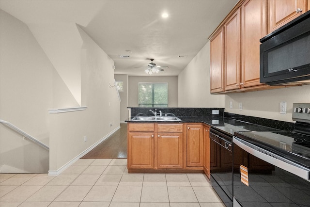 908 Glenn Crossett St, Arlington, TX 76010 - kitchen featuring black appliances, a sink, ceiling fan, a peninsula, and light tile patterned floors