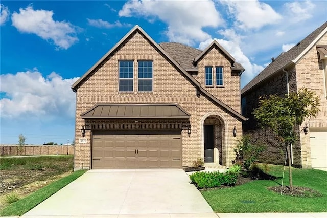 4557 El Paso Dr, Plano, TX 75024 - view of front of home with brick siding, driveway, an attached garage, a standing seam roof, and a front lawn