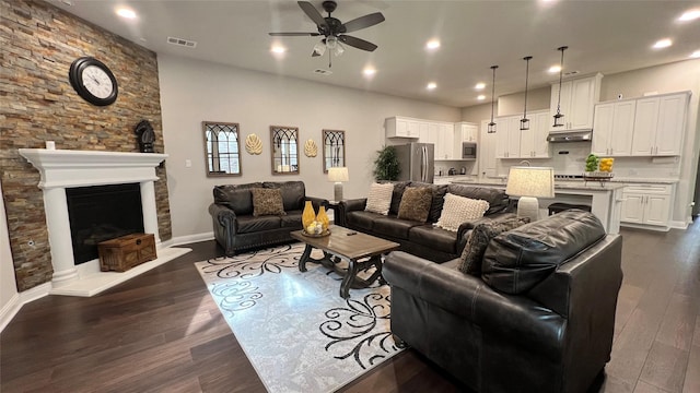 4557 El Paso Dr, Plano, TX 75024 - living area with ceiling fan, dark wood-style flooring, recessed lighting, and baseboards