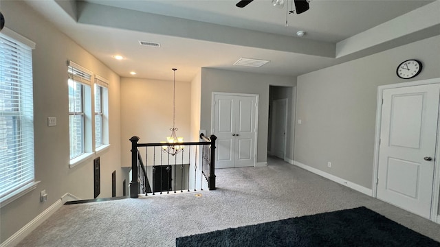 4557 El Paso Dr, Plano, TX 75024 - empty room featuring a chandelier, carpet floors, baseboards, and ceiling fan