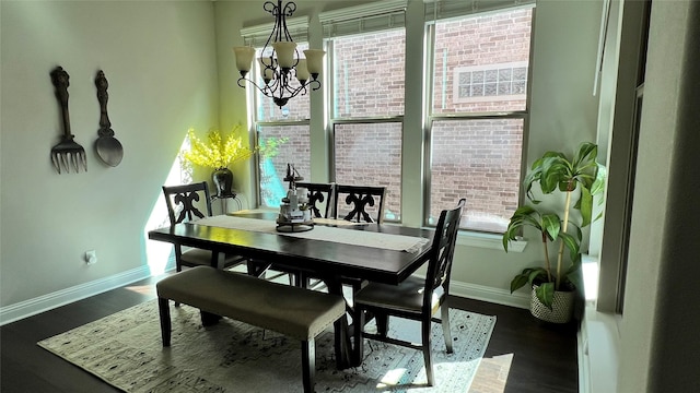 4557 El Paso Dr, Plano, TX 75024 - dining space featuring baseboards, a chandelier, and dark wood-style flooring