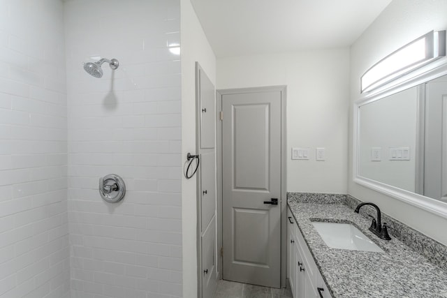 8652 Wolfwood Ln, Dallas, TX 75217 - full bathroom with vanity and tiled shower