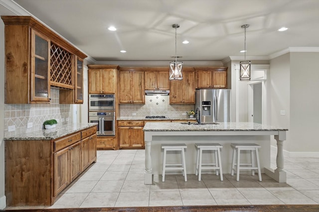 1309 Constitution Dr, Mckinney, TX 75071 - kitchen featuring appliances with stainless steel finishes, under cabinet range hood, ornamental molding, a sink, and light tile patterned floors