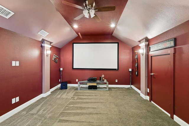 1309 Constitution Dr, Mckinney, TX 75071 - carpeted home theater with lofted ceiling, ceiling fan, and baseboards