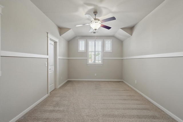 1309 Constitution Dr, Mckinney, TX 75071 - additional living space featuring a ceiling fan, light colored carpet, baseboards, and vaulted ceiling
