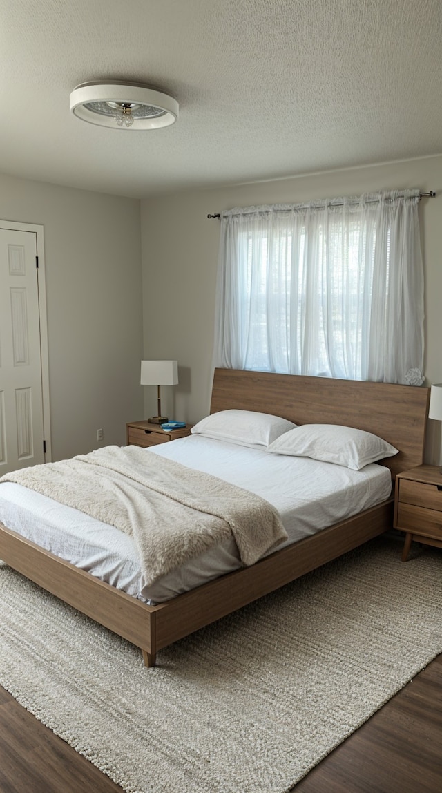 1709 Pamela Ln, Fort Worth, TX 76112 - bedroom featuring wood finished floors