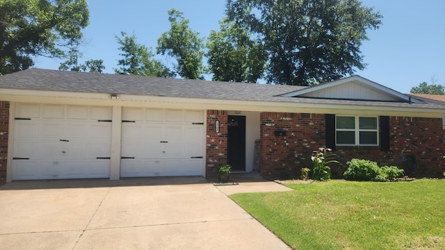 1709 Pamela Ln, Fort Worth, TX 76112 - ranch-style house featuring brick siding, driveway, a garage, a front lawn, and roof with shingles