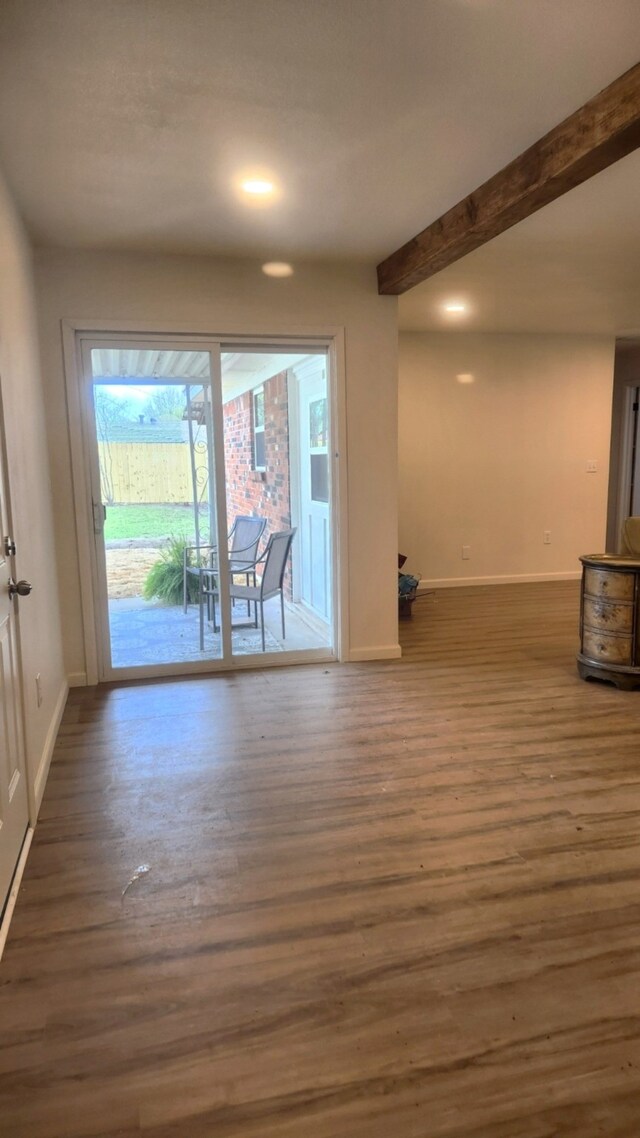 1709 Pamela Ln, Fort Worth, TX 76112 - unfurnished room with wood finished floors, baseboards, recessed lighting, and beamed ceiling