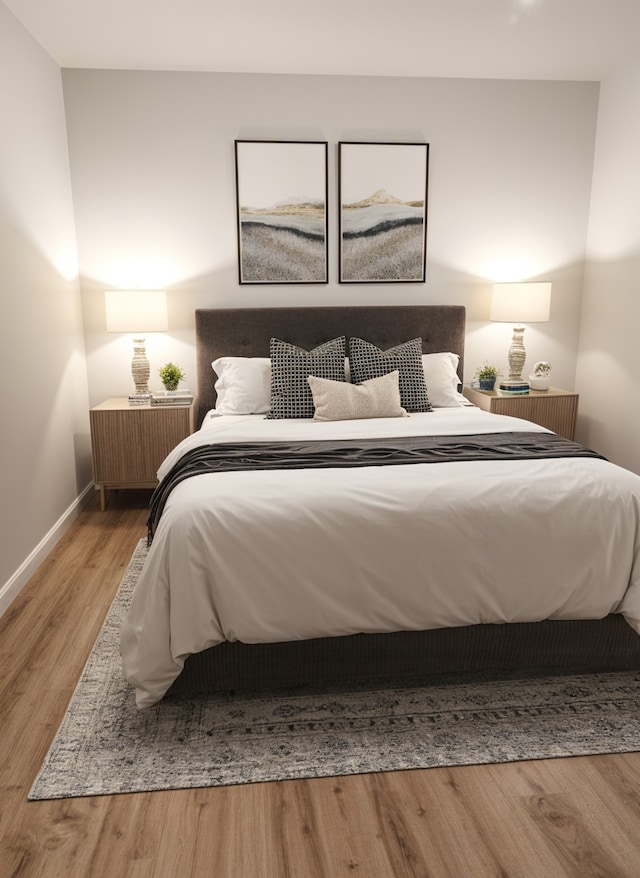 1709 Pamela Ln, Fort Worth, TX 76112 - bedroom featuring wood finished floors and baseboards