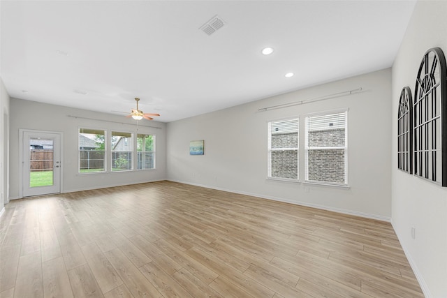 3117 Moldboard Dr, Mckinney, TX 75071 - unfurnished living room featuring ceiling fan, light wood-style floors, baseboards, and recessed lighting