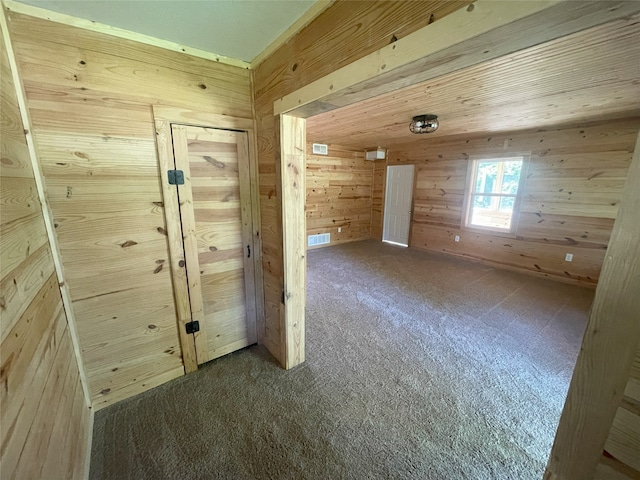 118 Ricky Rd, Gun Barrel City, TX 75156 - spare room with carpet flooring and wood walls