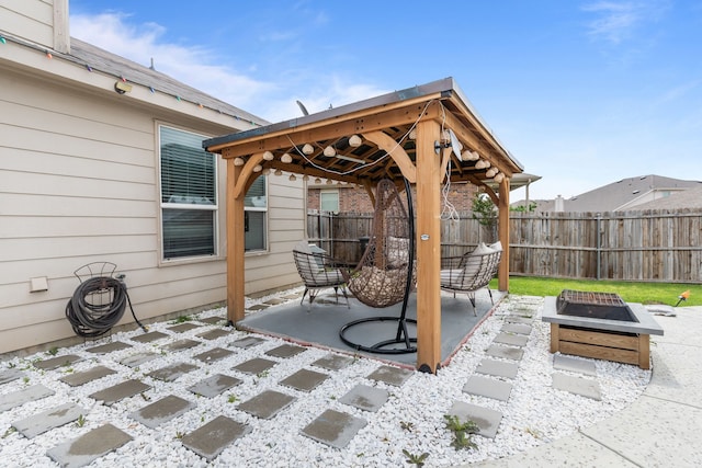 2304 Bermont Red Ln, Fort Worth, TX 76131 - view of patio / terrace with a fire pit, a fenced backyard, and a gazebo