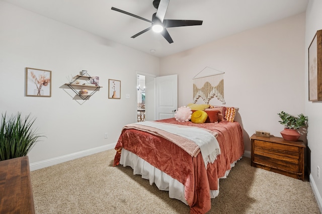 bedroom with carpet, baseboards, and ceiling fan