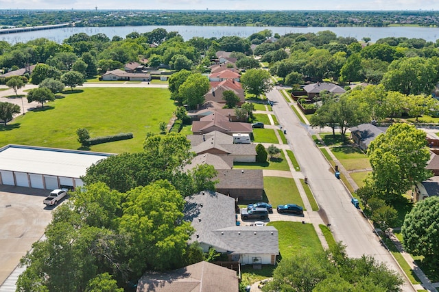 aerial perspective of suburban area with a large body of water