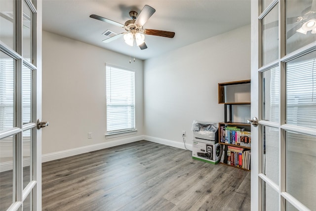 7332 Carnation St, Little Elm, TX 76227 - unfurnished room featuring wood finished floors, french doors, ceiling fan, and baseboards
